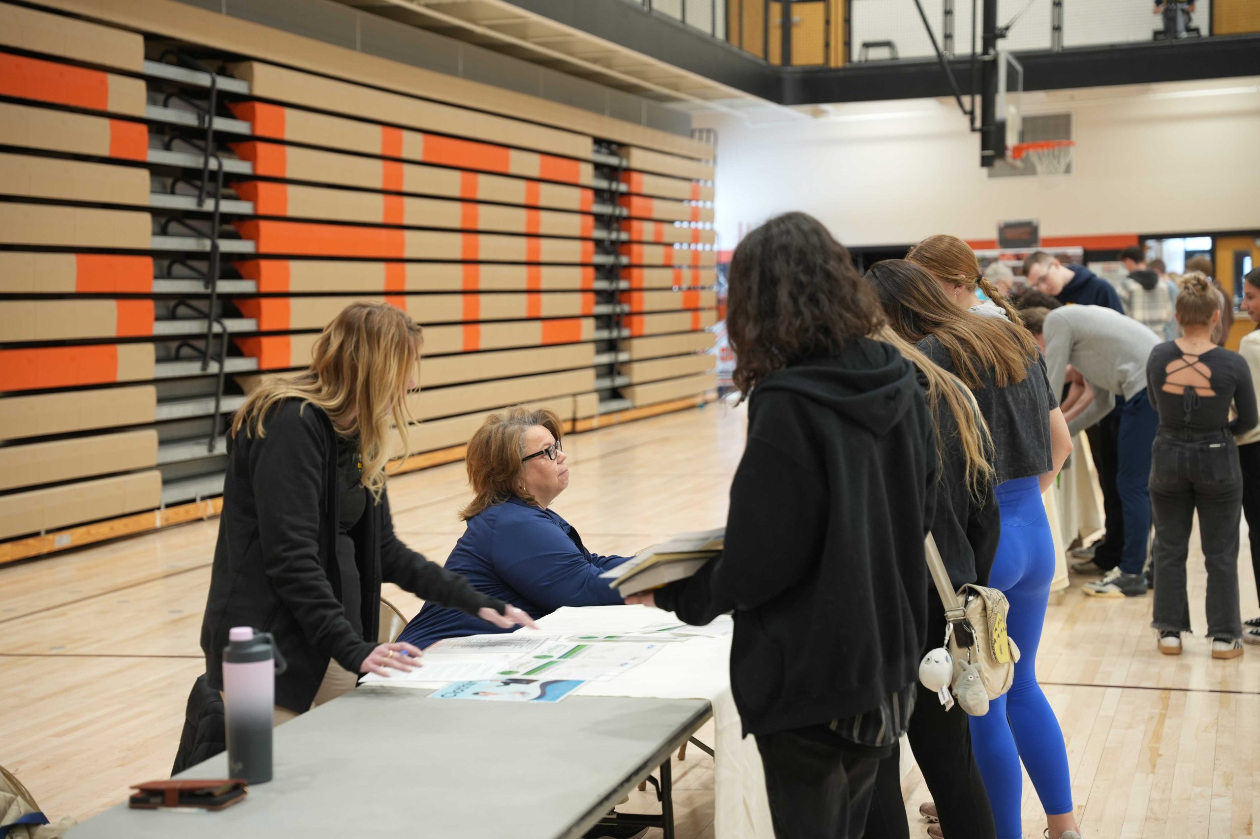 President/ CEO Paula J. Megowen talks to students at Financial Reality Fair.