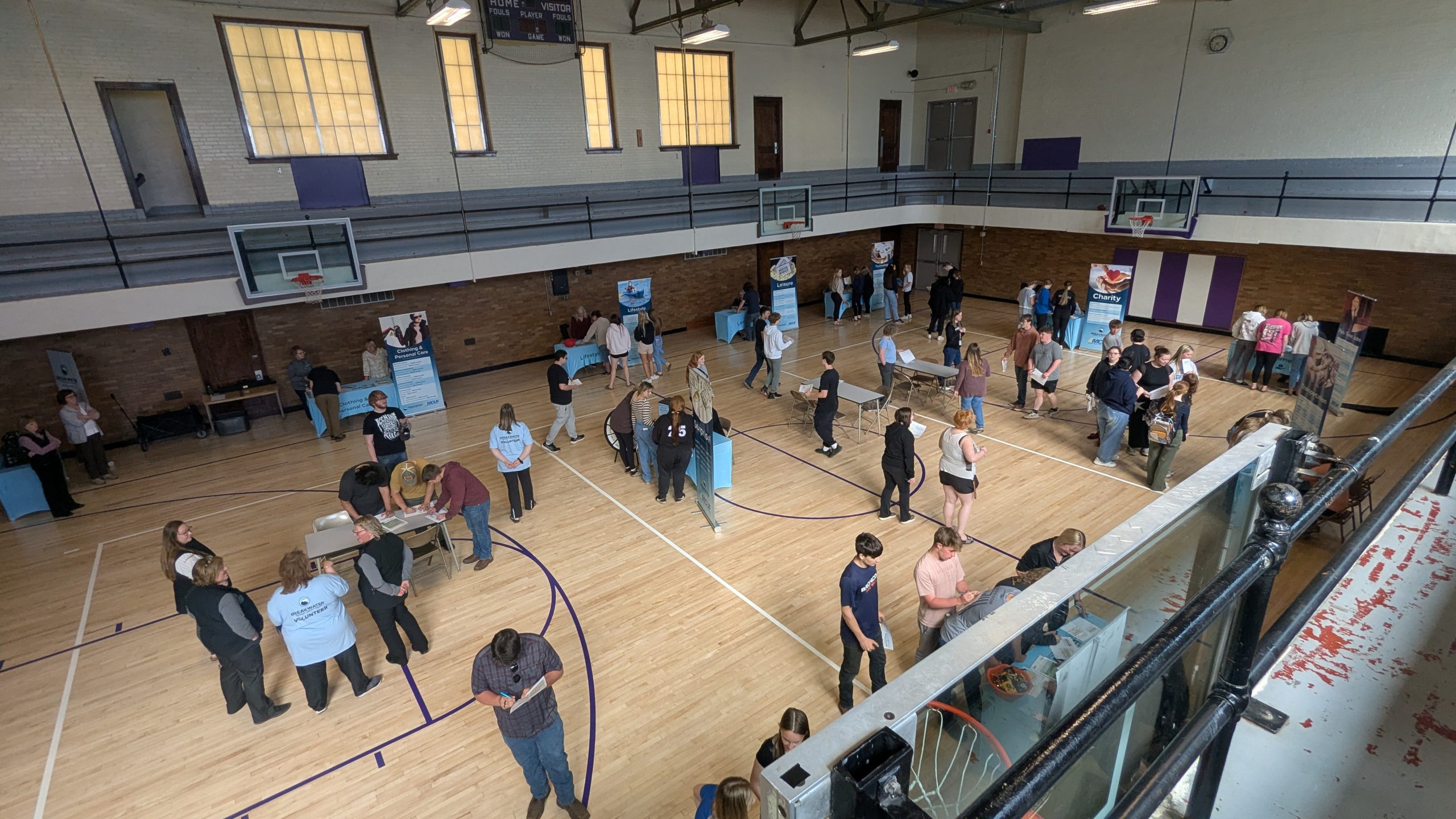 Students rotate through different stations during the L'Anse Financial Reality Fair.